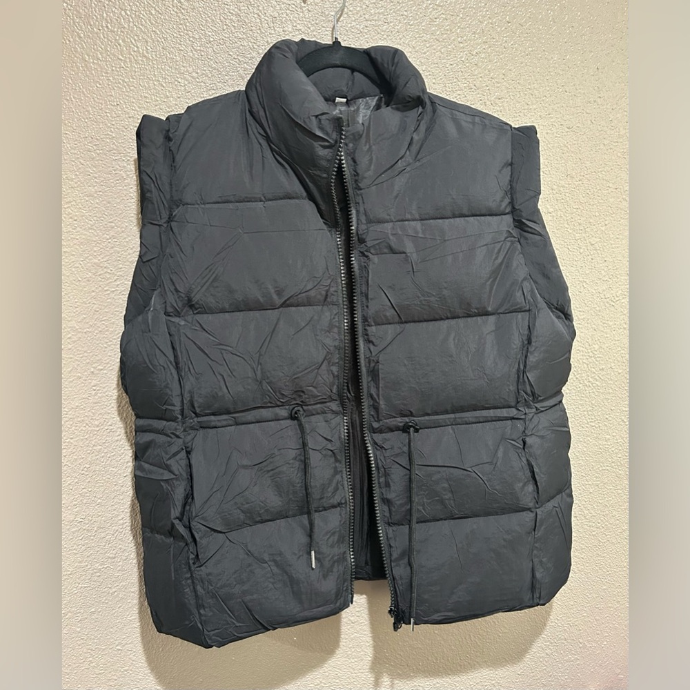 womans black puffer vest